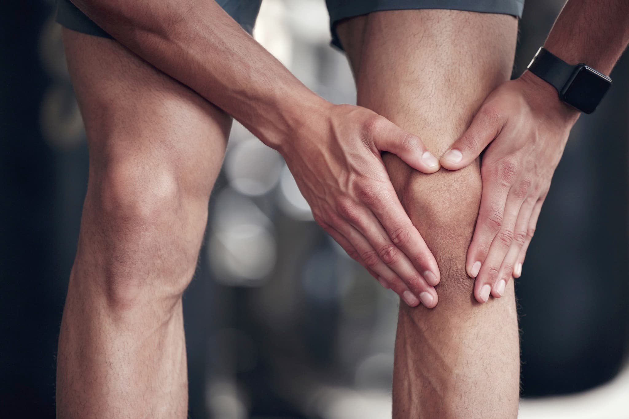 knee-pain-closeup-sports-injury